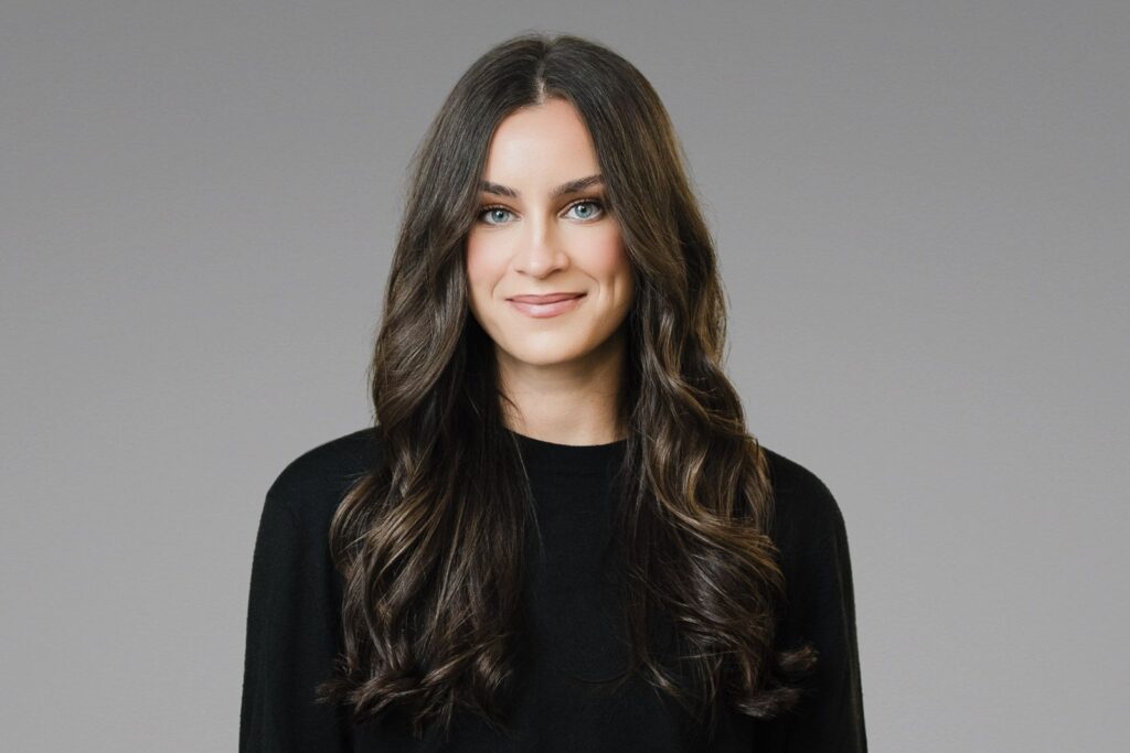 Professional LinkedIn headshot of a woman with natural expression and direct eye contact, photographed by Alex Kaplan in Northern New Jersey
