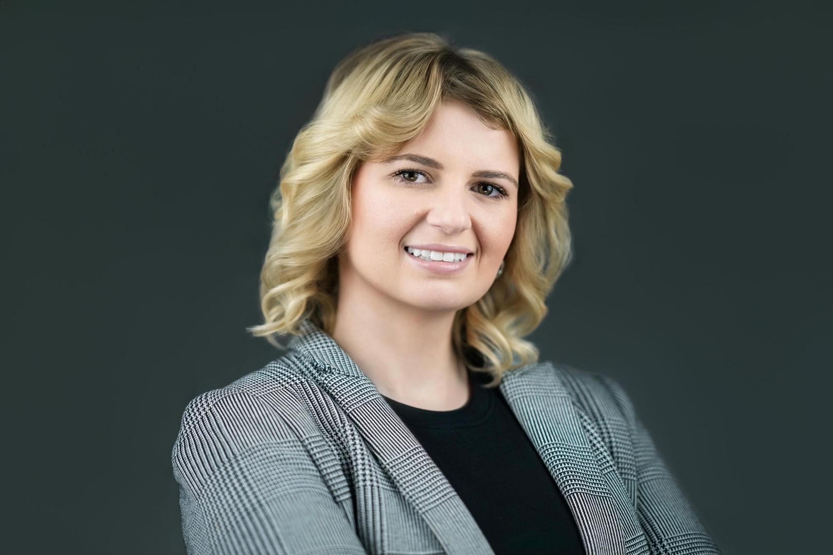 Professional showing natural expressions during a business portrait session in Northern New Jersey