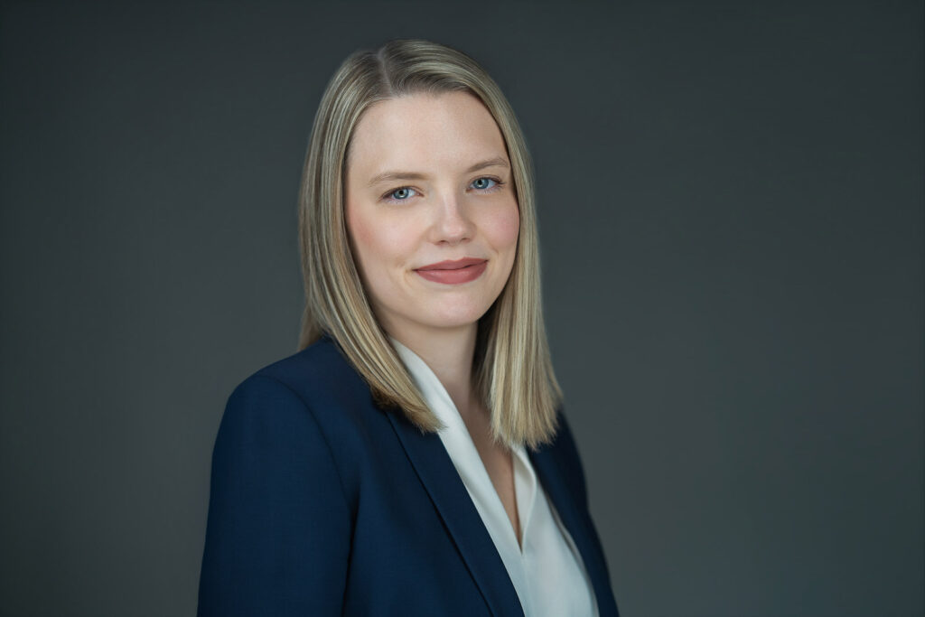 Business professional with a calm, composed expression during a corporate headshot in New Milford, NJ