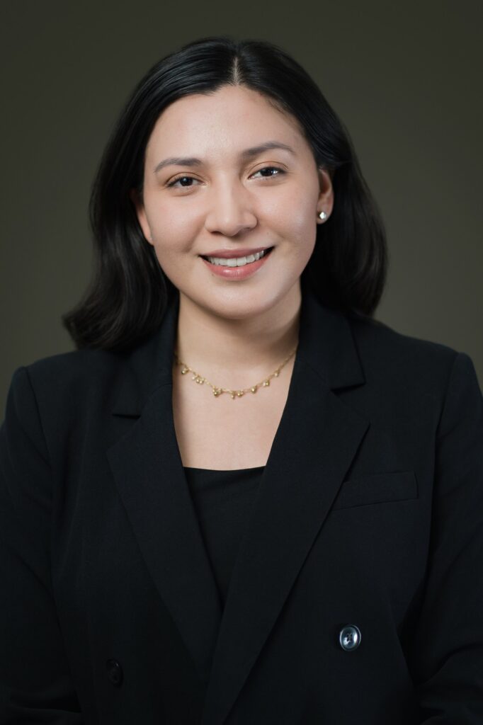 Professional LinkedIn headshot of a remote professional on a clean studio background