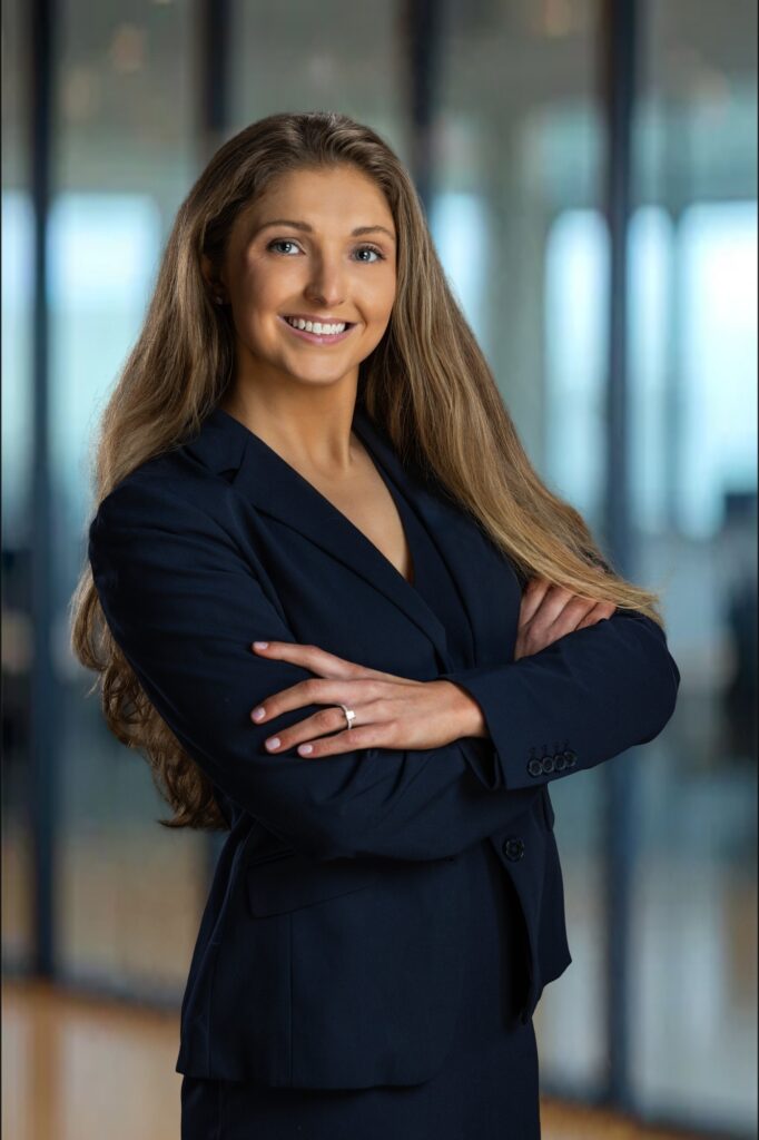 Professional with a genuine, confident smile during a natural headshot session in New Jersey