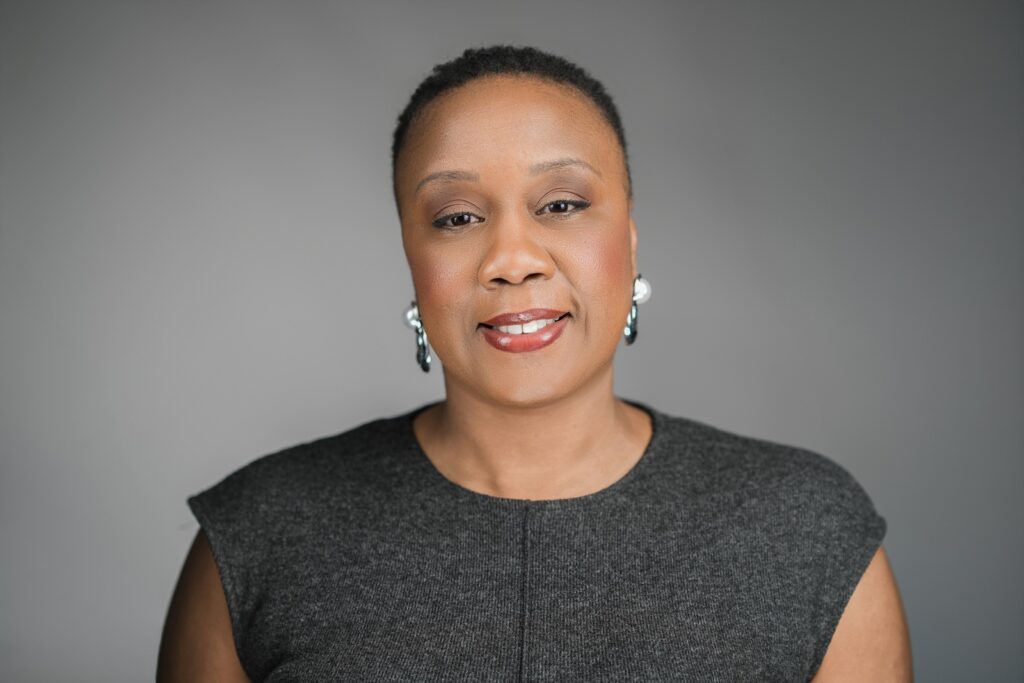 Woman photographed for a professional headshot at Alex Kaplan's New Jersey studio