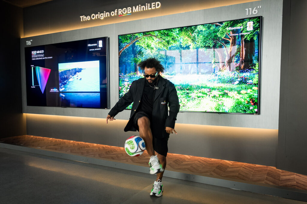 Guest demonstrating football skills during a Hisense brand activation in New York