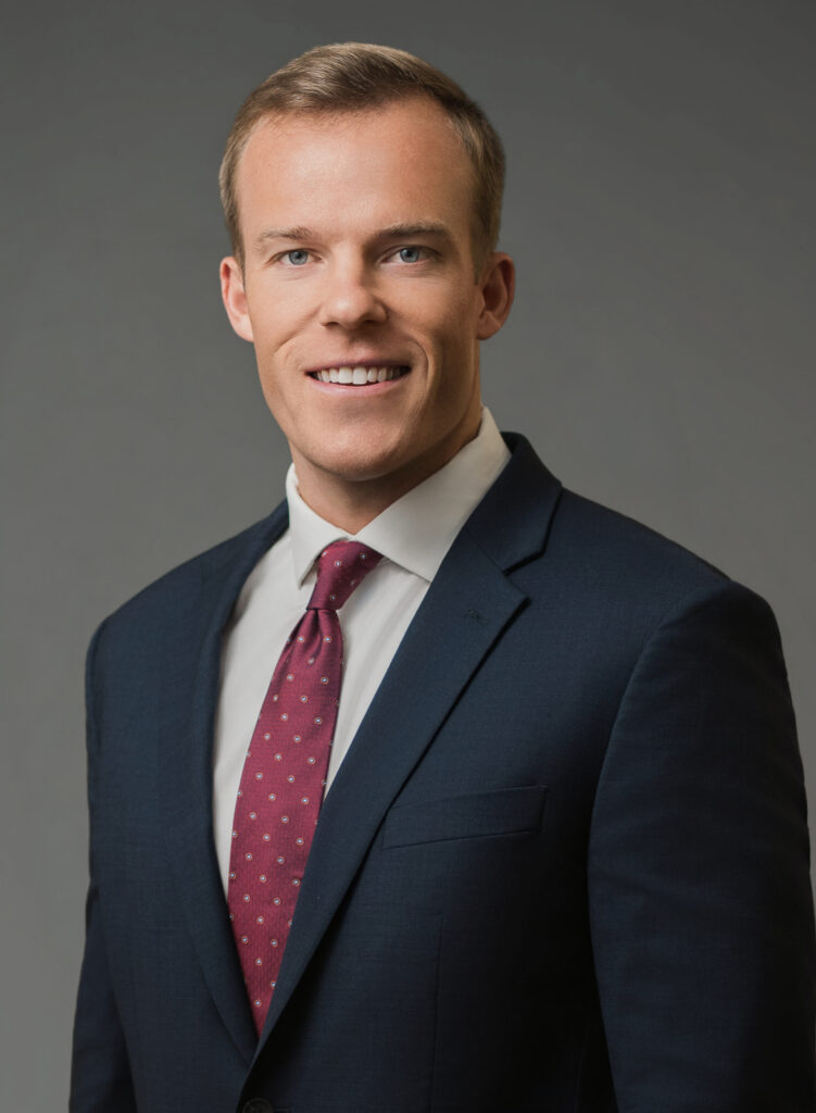 Male executive with a relaxed confident expression during a corporate headshot session in Northern New Jersey