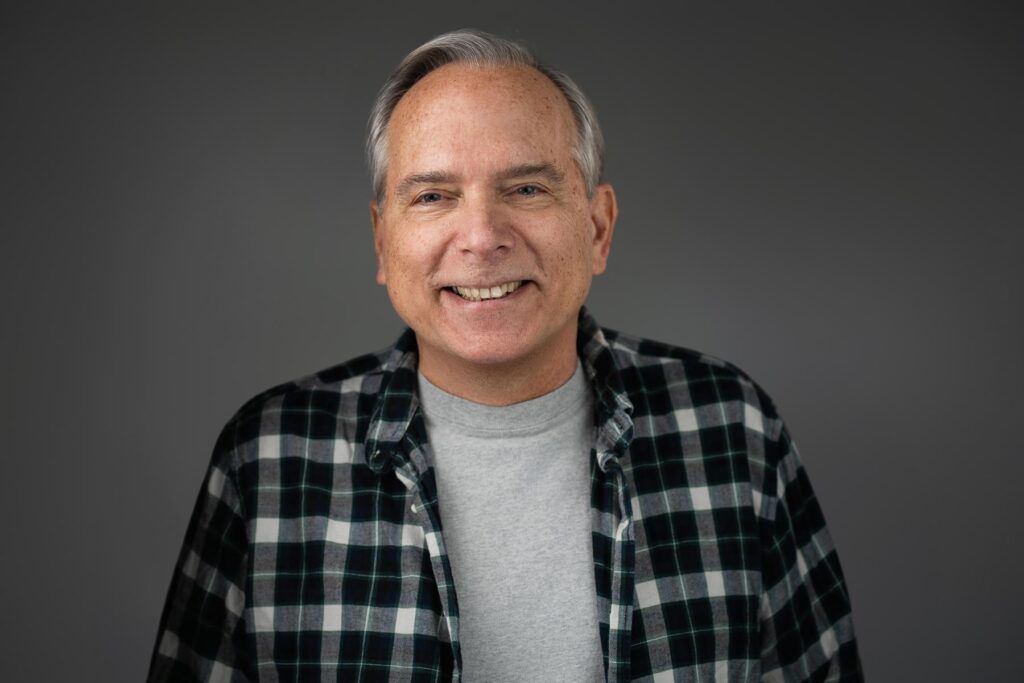 Actor in plaid shirt photographed for warm everyday casting read in Northern New Jersey