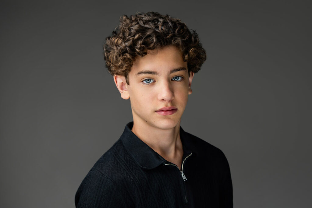 Teen actor holding a calm expression during a headshot session in New Milford NJ studio