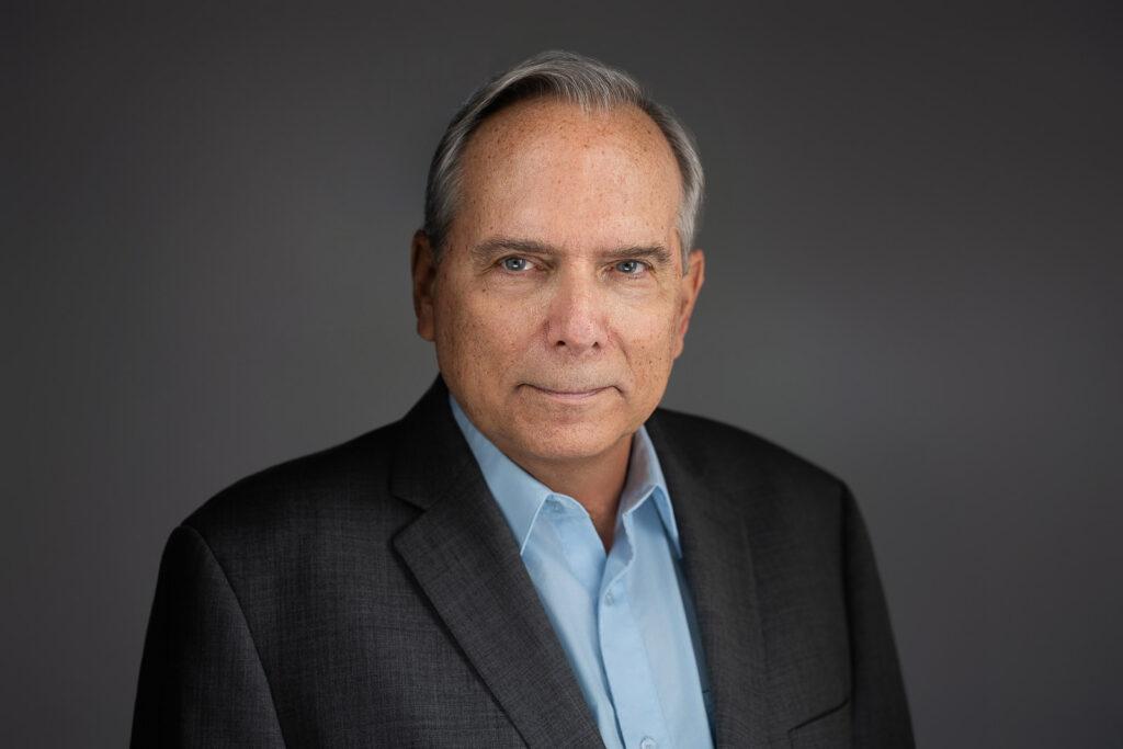 Actor in dark suit photographed for professional authority casting read serving NYC and NJ