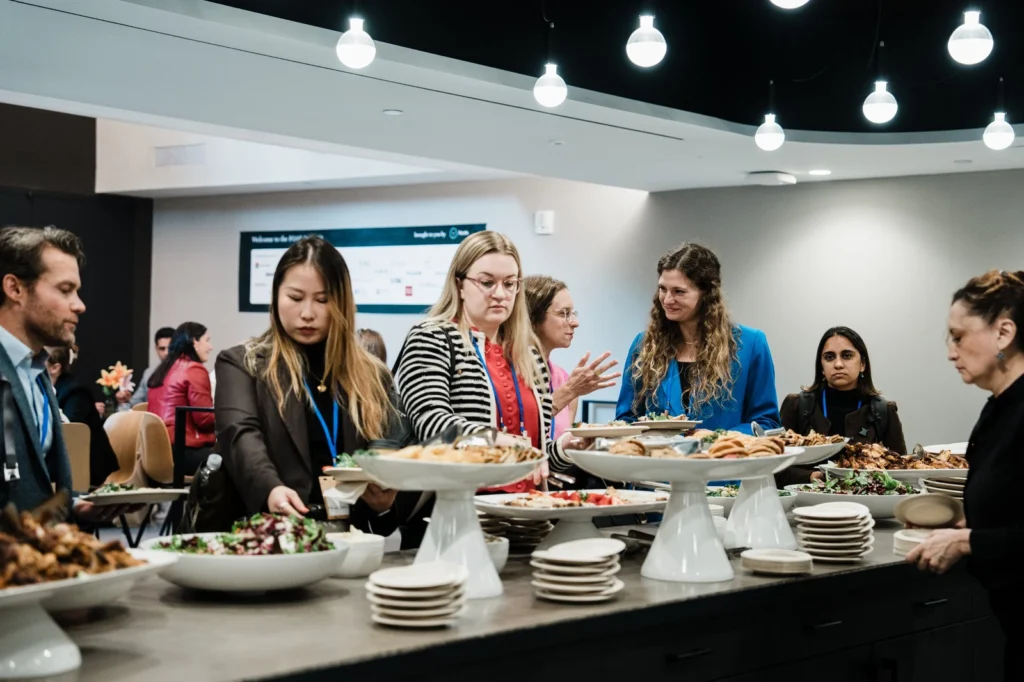 Attendees networking over lunch at the FOAK Summit in NYC
