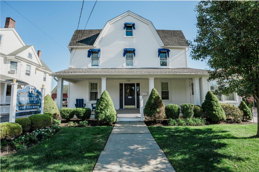 Front facade and walkway of a dental practice photographed by Alex Kaplan in Manasquan, New Jersey