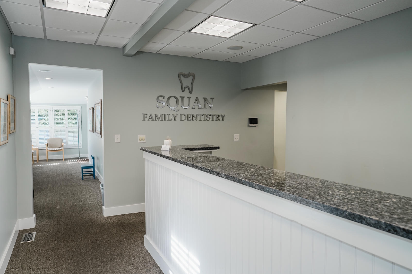 Reception desk of a dental practice photographed by Alex Kaplan in Manasquan, New Jersey