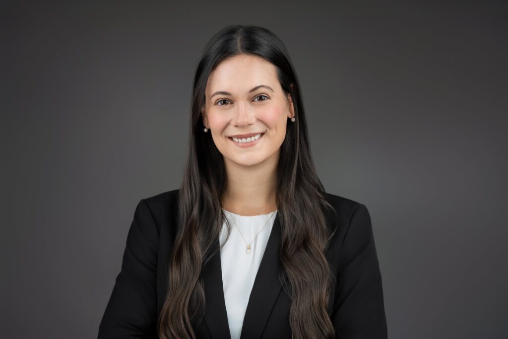 Professional headshot of woman in black blazer photographed in New Jersey